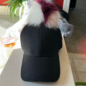 Puff ball hat, brand new with tag.